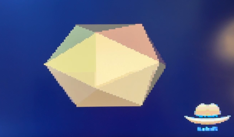 The monitor on my desk, showing
the icosahedron and the logo
