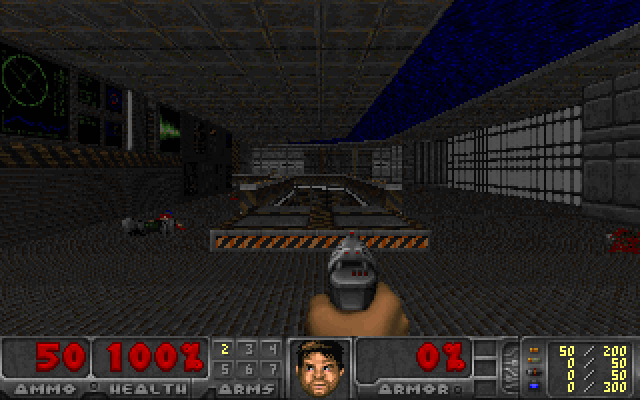 The first level of
    Freedoom: a grey room with a pistol in the foreground and the status
    bar at the bottom